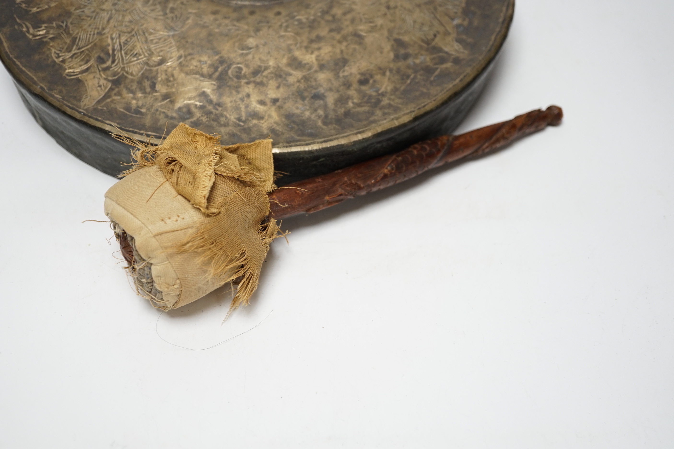 An Indonesian silver plated gong and beater, gong 33cm diameter